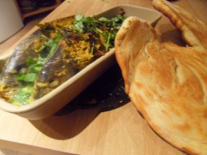 Indian fish curry with naan bread