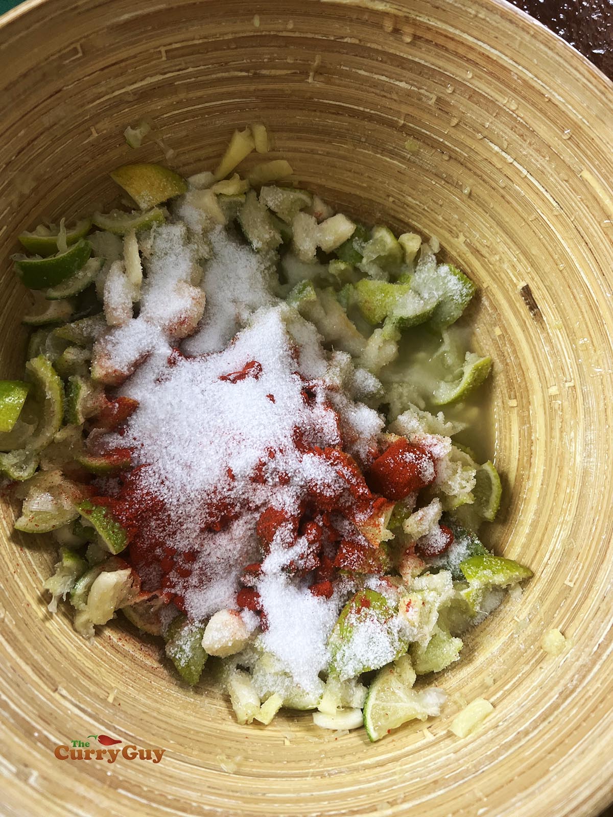 Adding chilli powder and salt