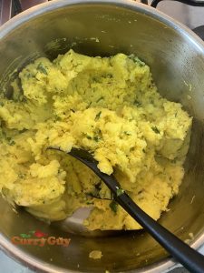Adding mashed potatoes