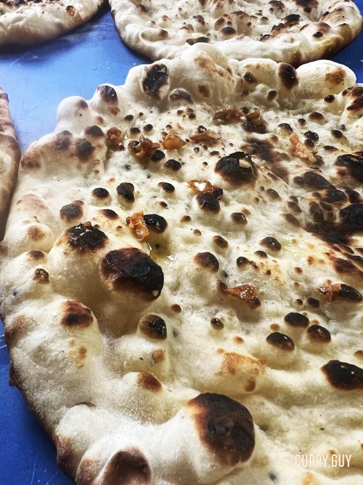 Close up of a stovetop naan.