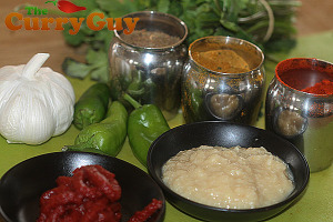 Making chicken chilli garlic curry