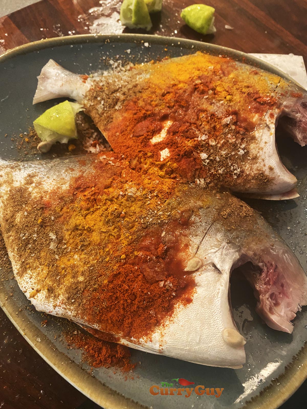 Rubbing spices on fish