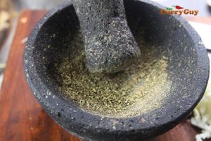 Grinding spices.