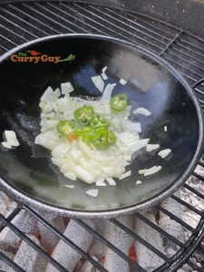 Frying onions and chillies
