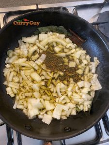 Stirring chopped onions