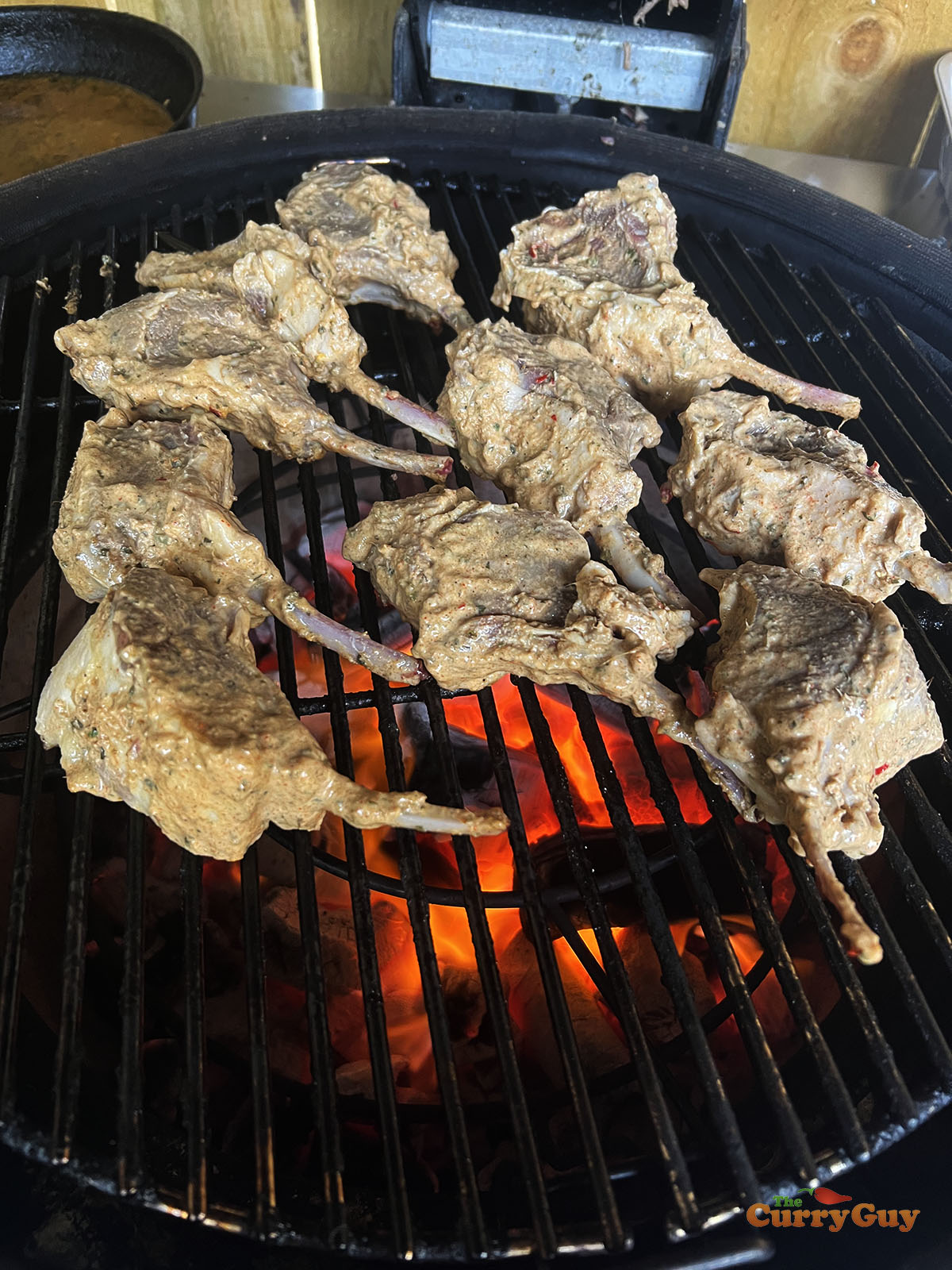 Cooking the tandoori lamb chops on the barbecue.