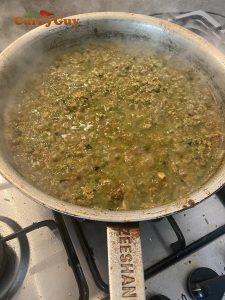 Simmering the lamb keema curry