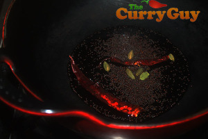 Making coriander pork curry