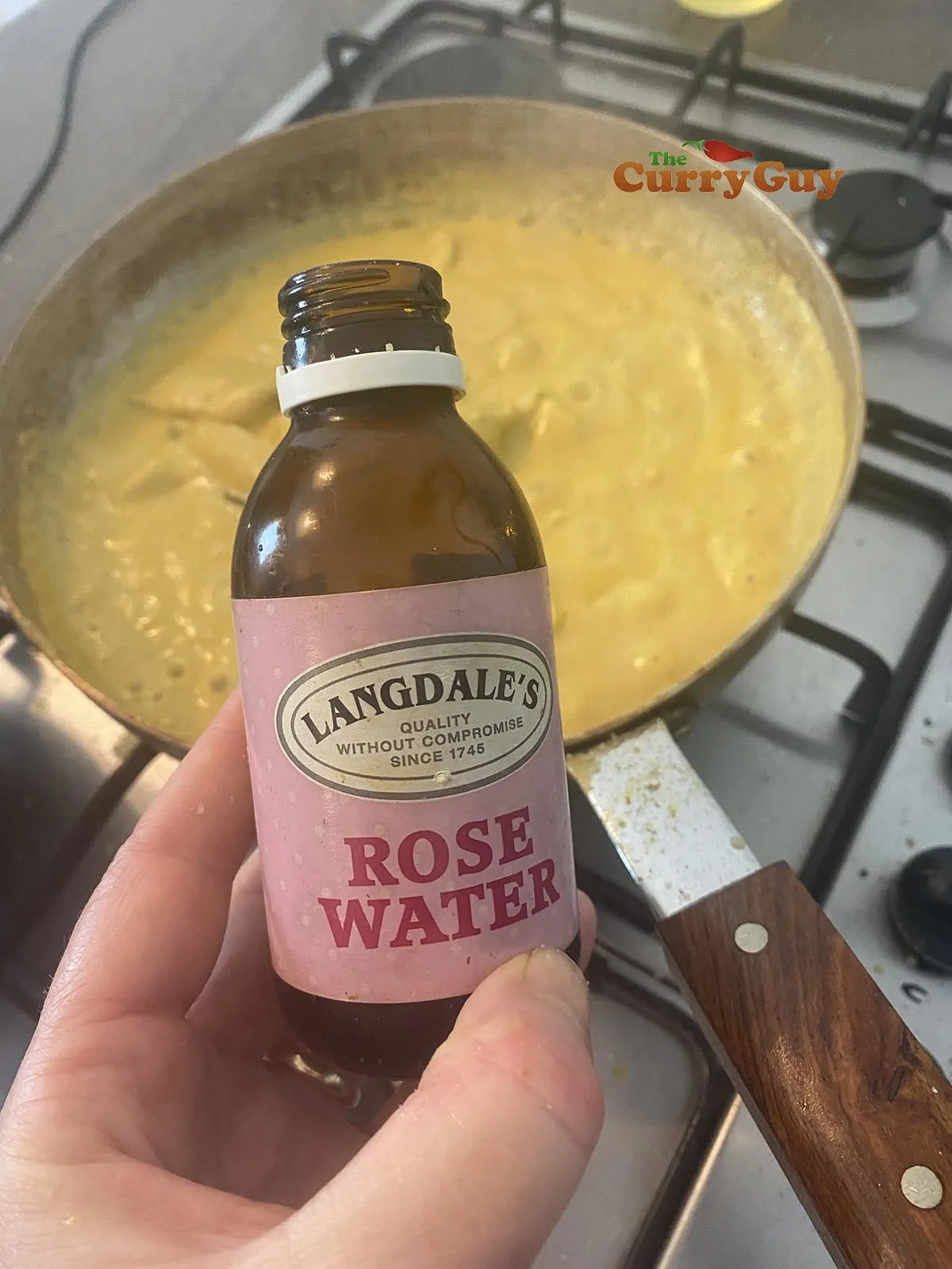 adding rose water to the sauce