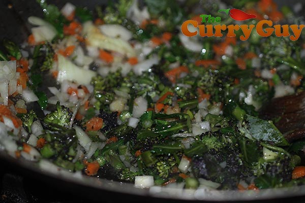 Making vegetable fried rice.