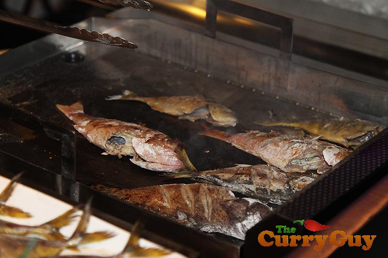 Cooking fish at Hikka Tranz