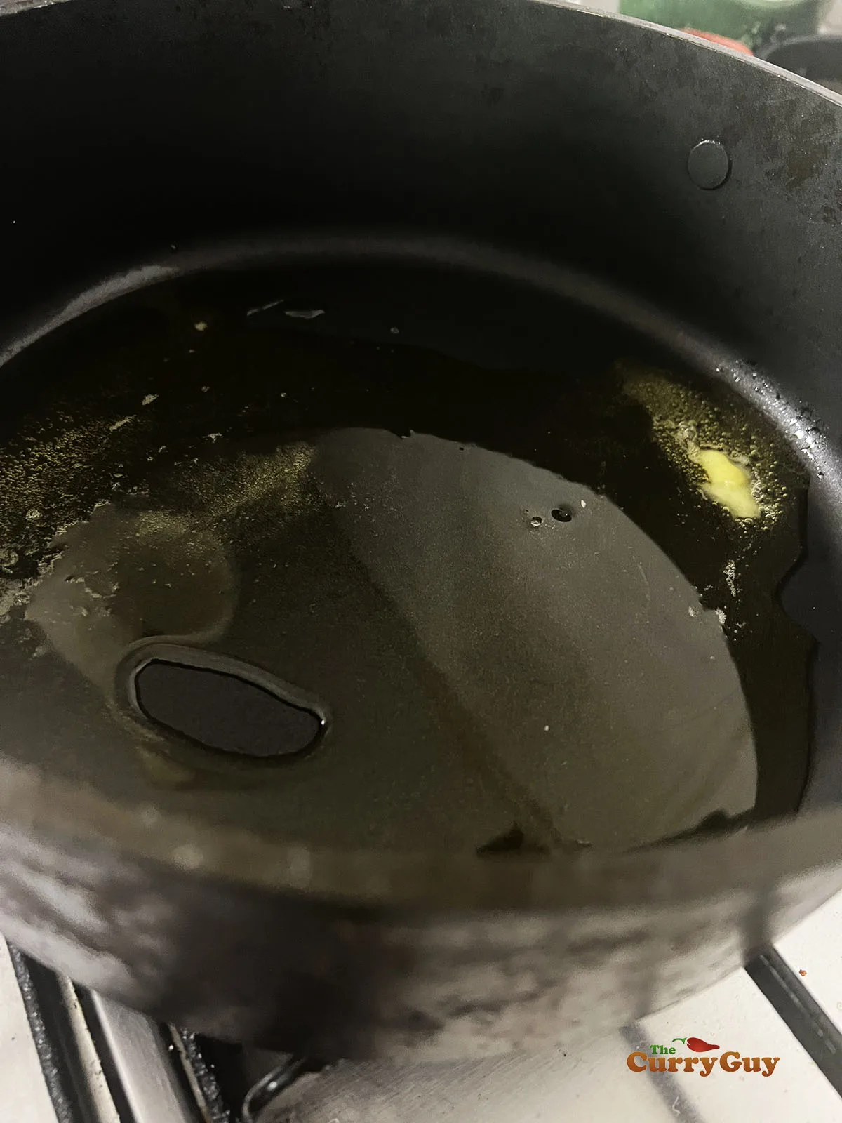 Melting ghee in a pan