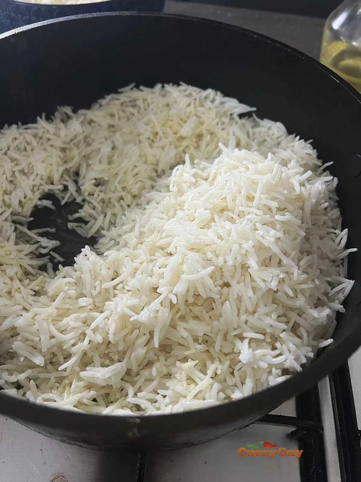 Stirring rice into hot ghee.