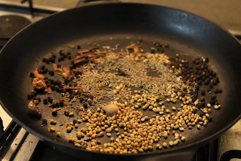 toasting the whole spices in a pan