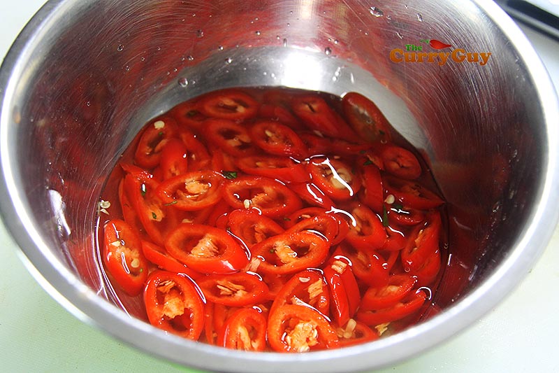 Making Thai red chilli pickle