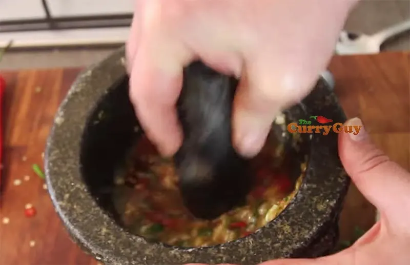 Making Thai seafood sauce for Thai Salt crust fish