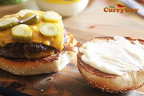 Adding pickles to a burger