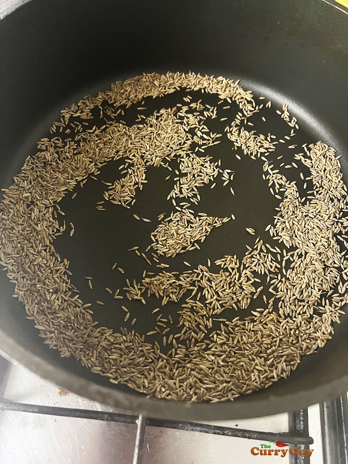 Toasting the cumin seeds