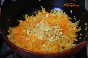 frying onions and carrots for Kastu