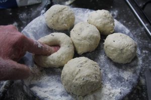 Dividing dough into dough balls