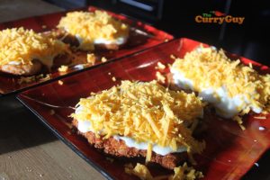 topping parmos with cheese