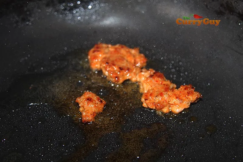 Frying small amount of sausage meat.