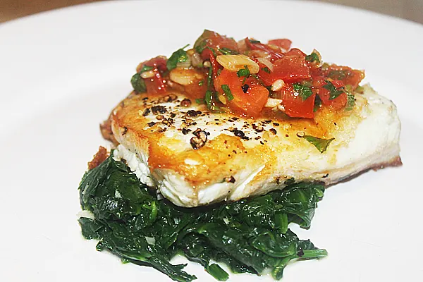 Pan Seared Halibut With Spinach and A Spicy Tomato Sauce