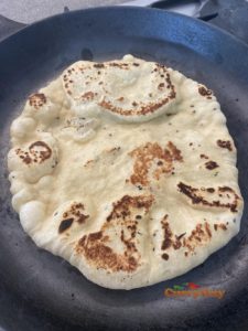 Flipped naan with browning marks