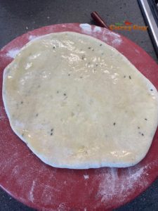 Top of naan brushed with oil