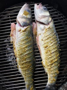 Grilling the sea bass Thai style