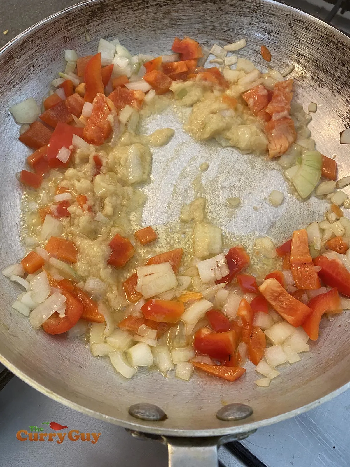 Adding garlic and ginger paste