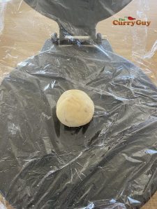 dough ball ready to make into a papad
