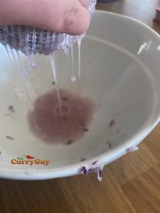 Squeezing moisture out of onion
