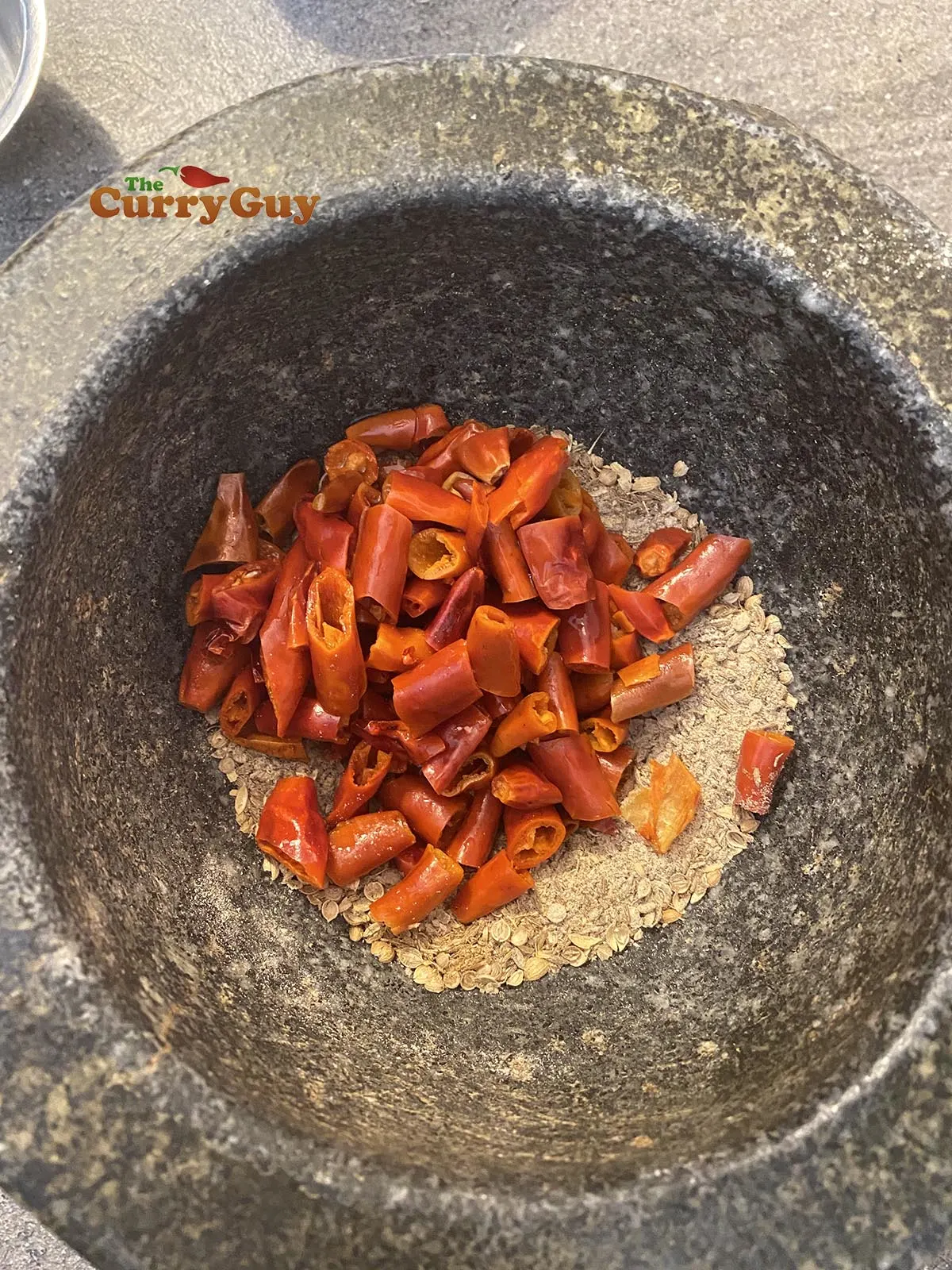 Pounding dried chillies