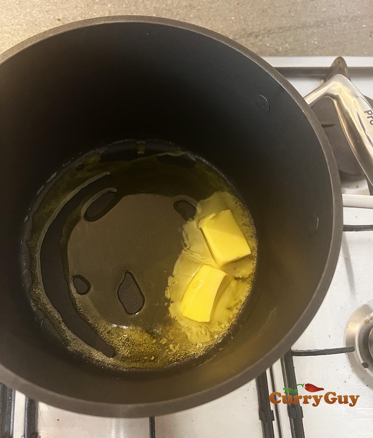 Butter and oil heating in pan