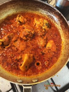 Finished chicken phall curry