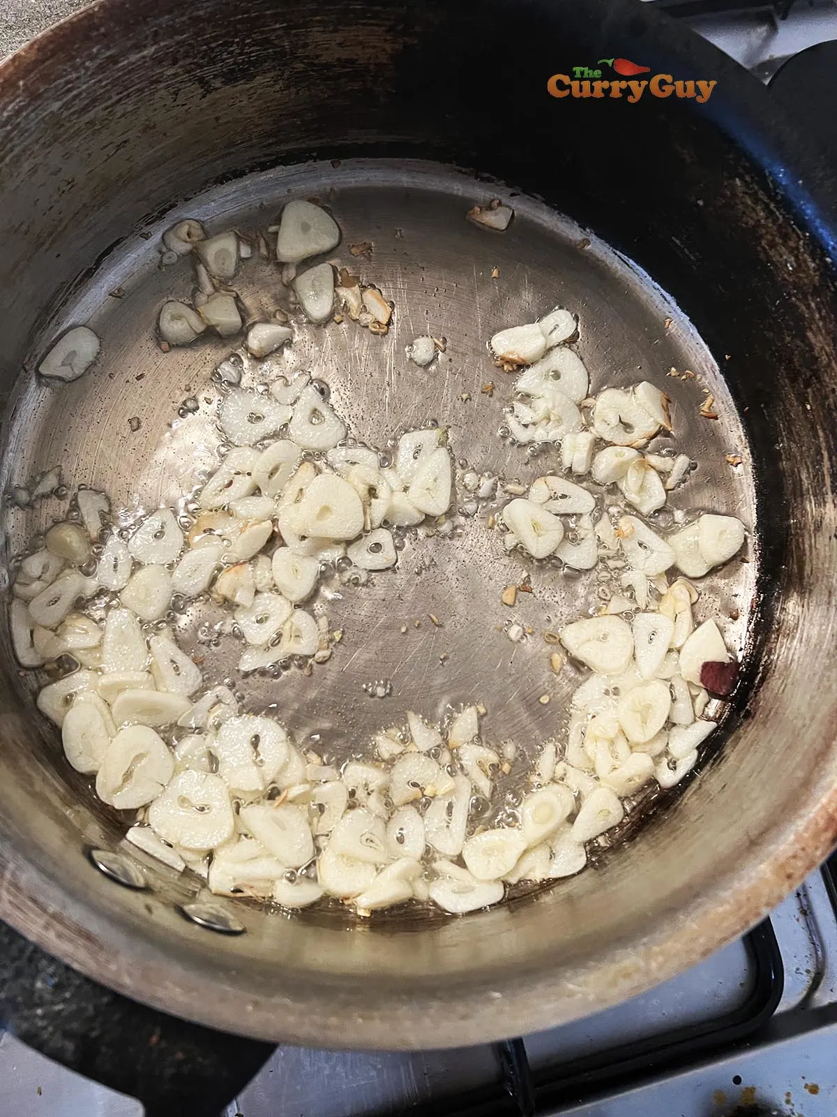 Frying garlic slivers