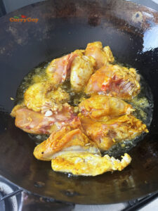 Chicken frying in ghee