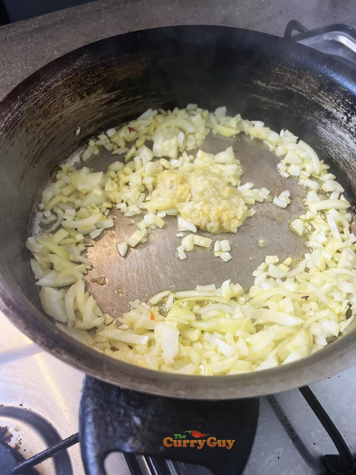 Frying onions in frying pan