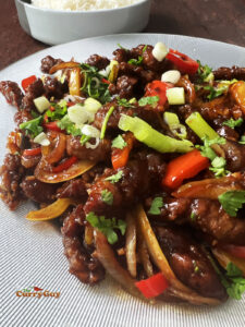 Chinese crispy beef being served