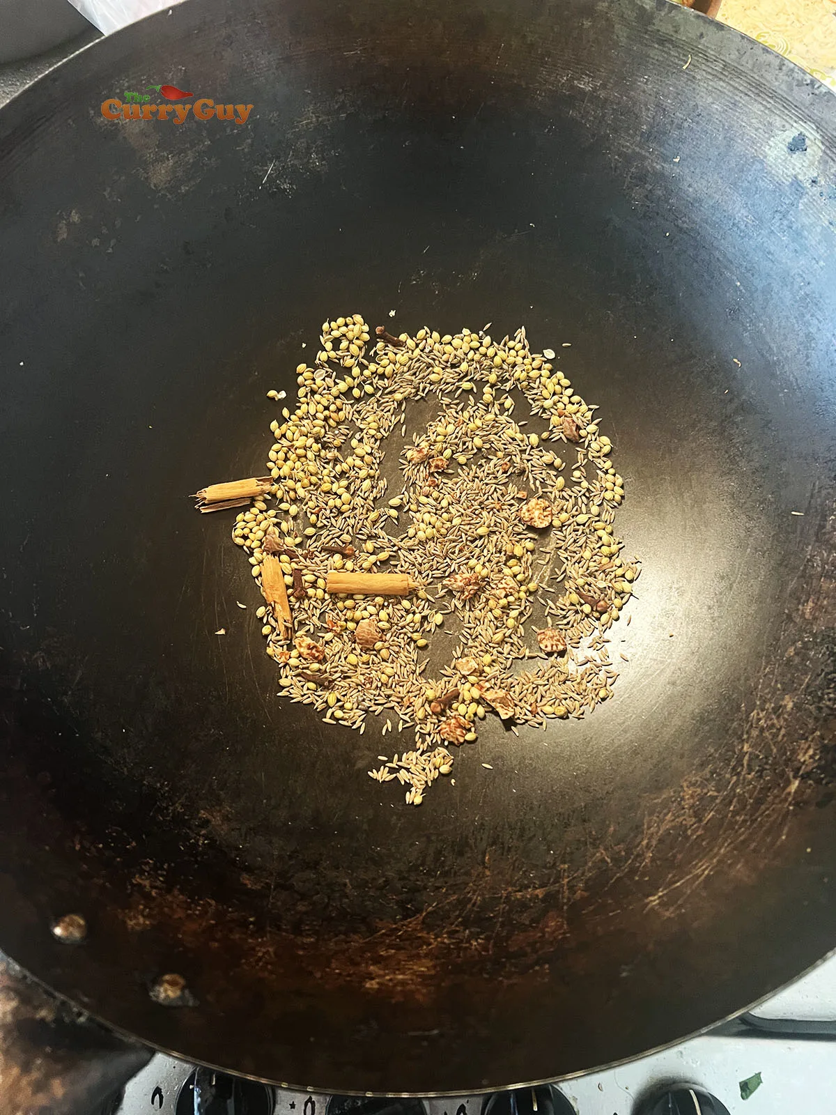 Roasting whole spices in a wok