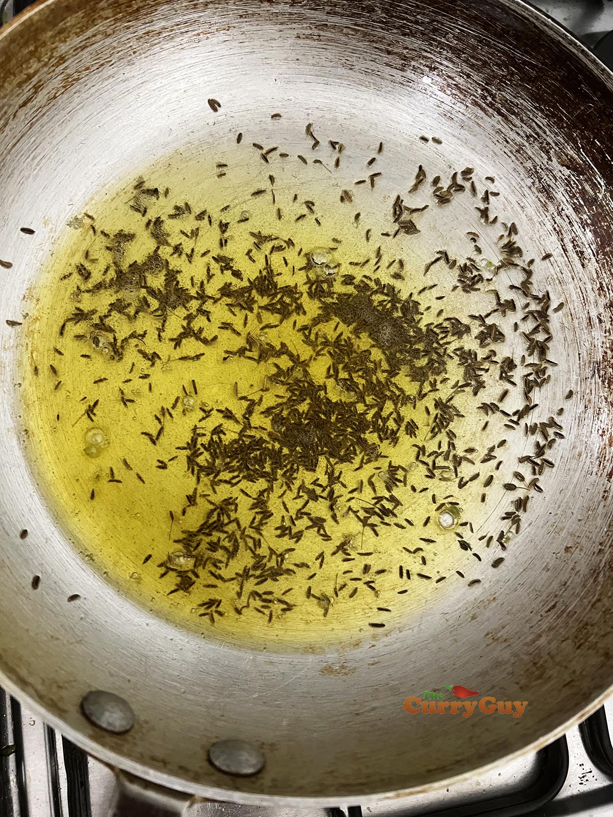 Infusing black cumin seeds into the ghee