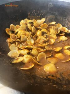 Simmering spicy clams