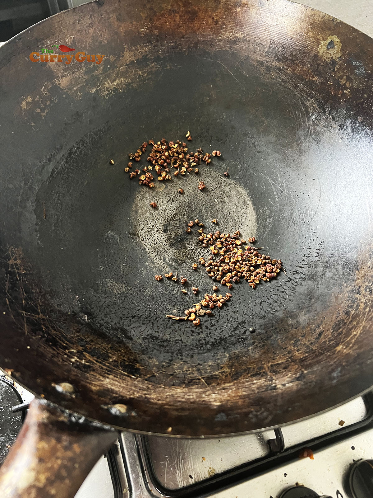 Toasting the Szechuan peppercorns