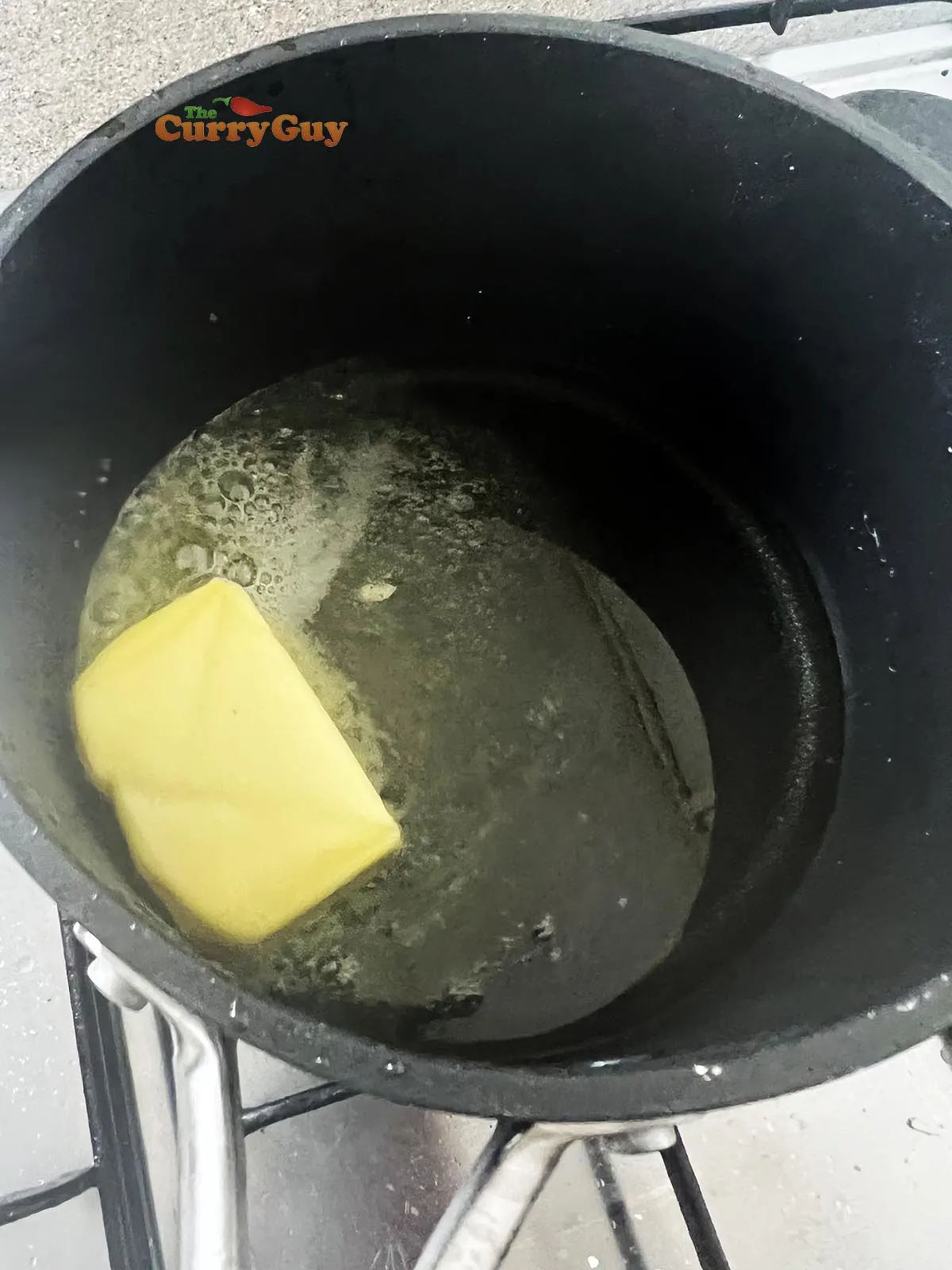 Melting butter into oil in the pan