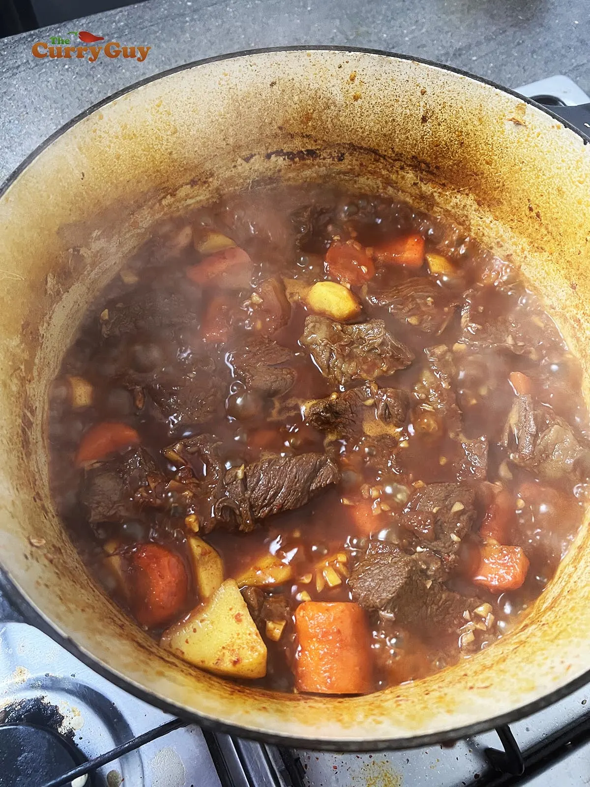 Korean beef stew cooking down and thickening.