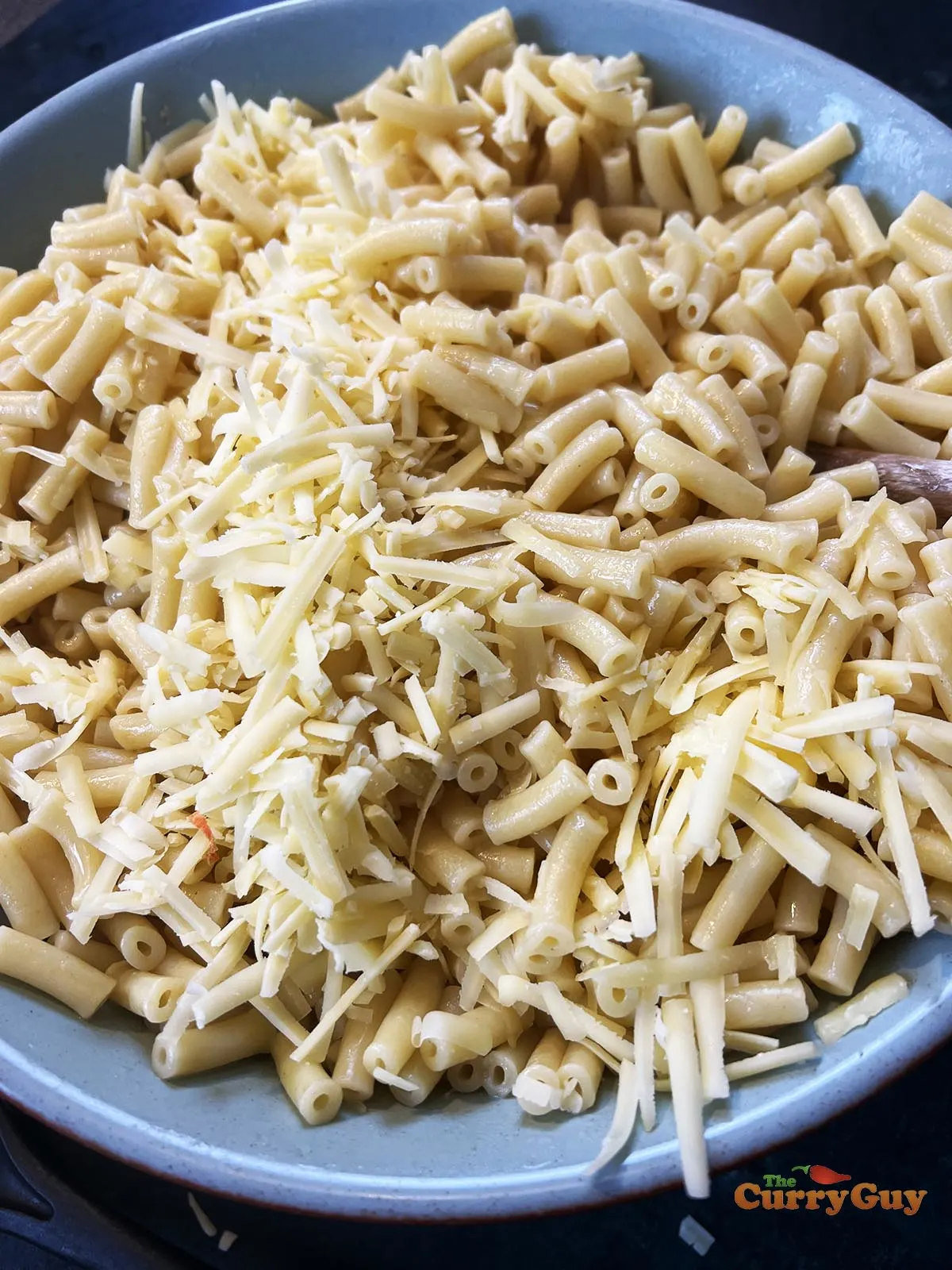 Cheese added to the macaroni