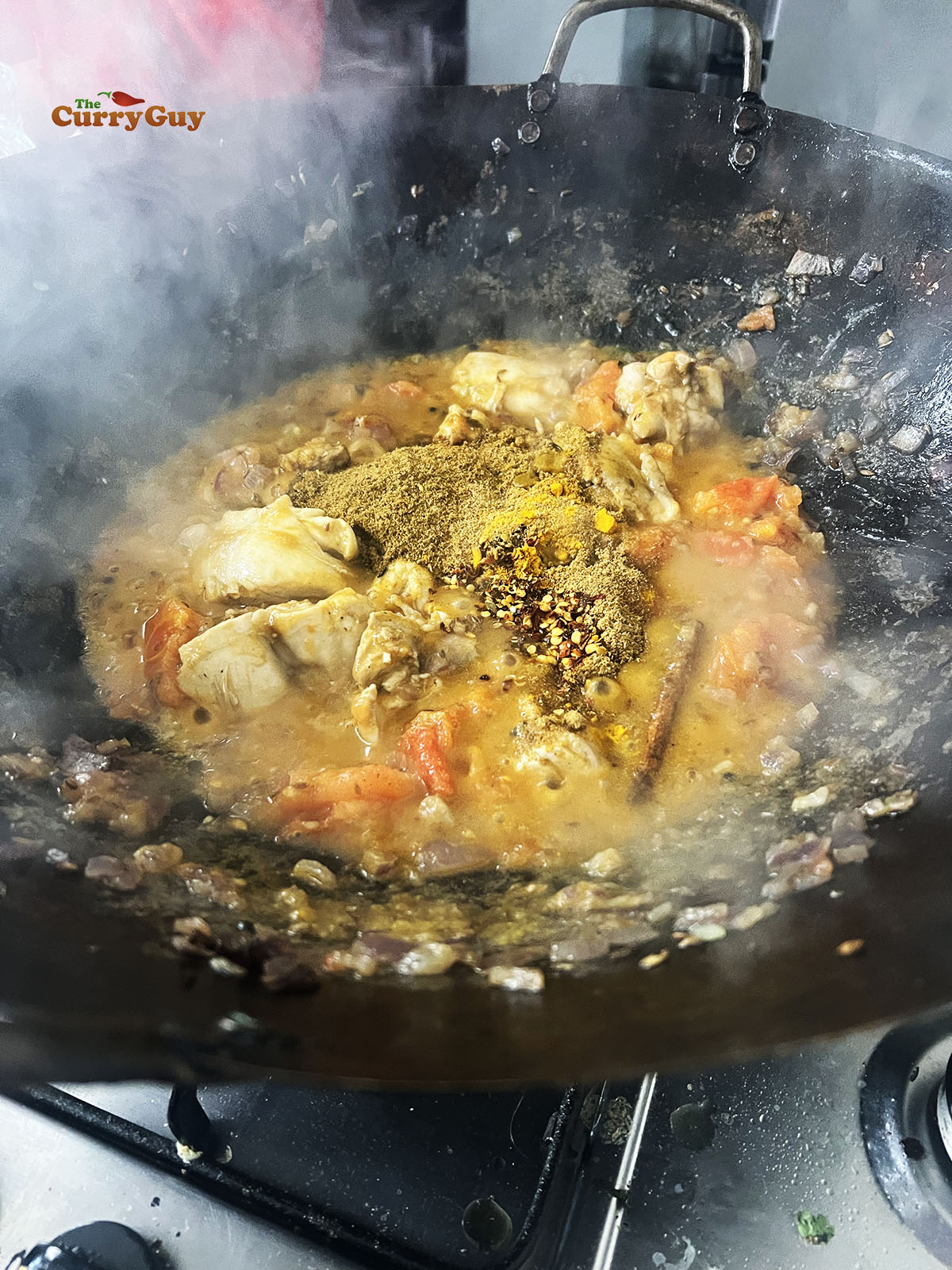 Simmering the curry over a high heat.