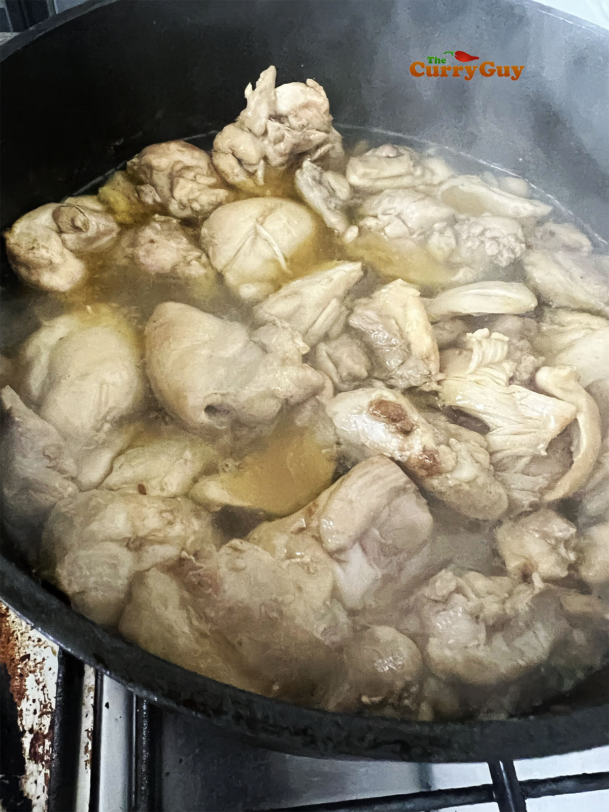 Cooked chicken in the ghee.