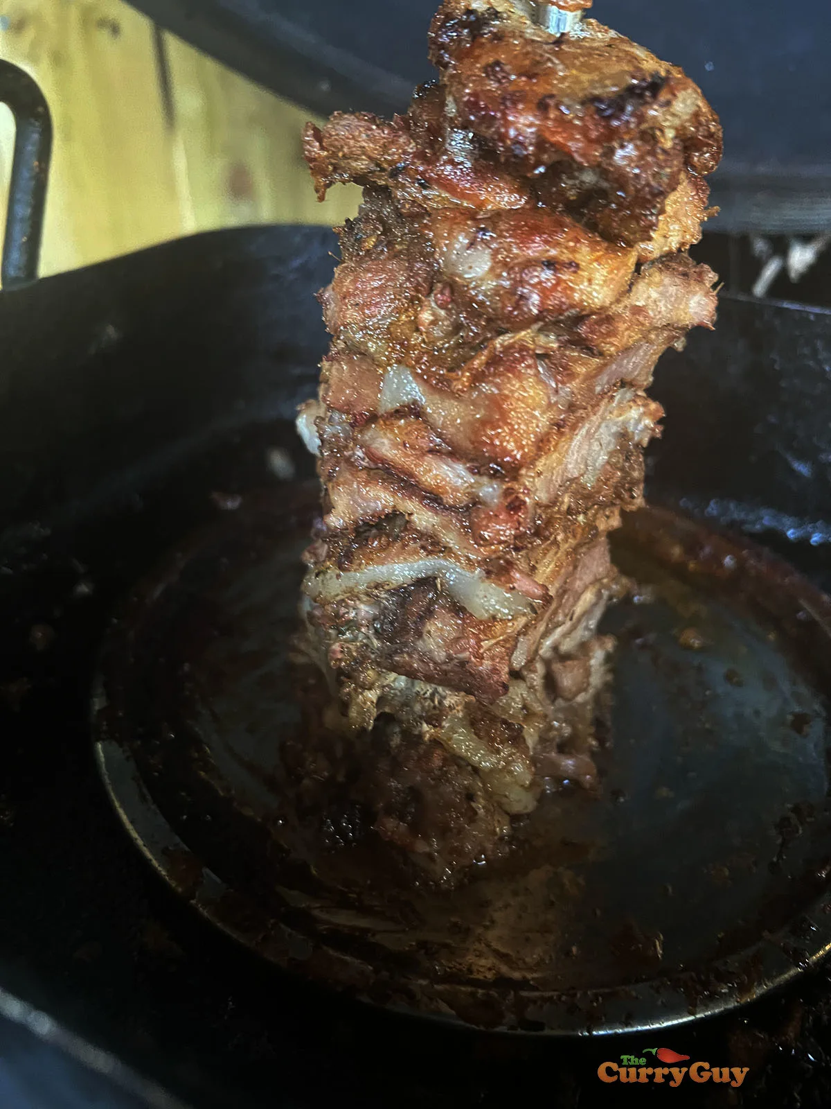 Greek gyro meat continuing to cook.